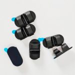 Dual-Slot Oval Silicone Cord Organizer with Adhesive Backing