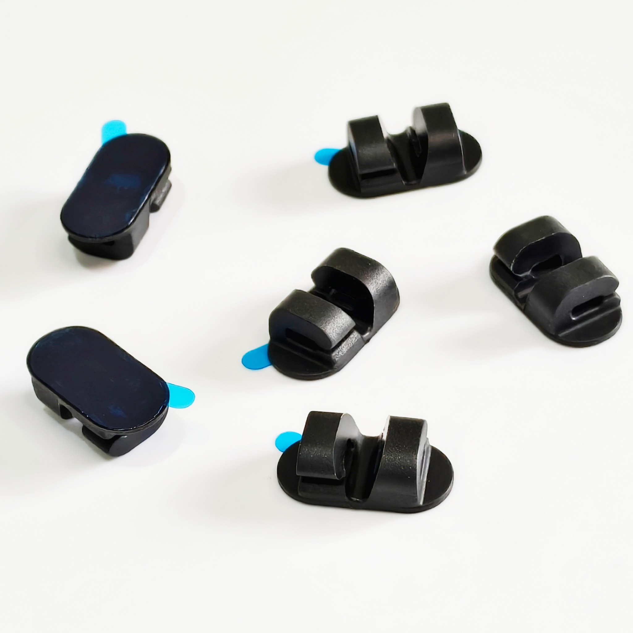 Dual-Slot Oval Silicone Cord Organizer with Adhesive Backing