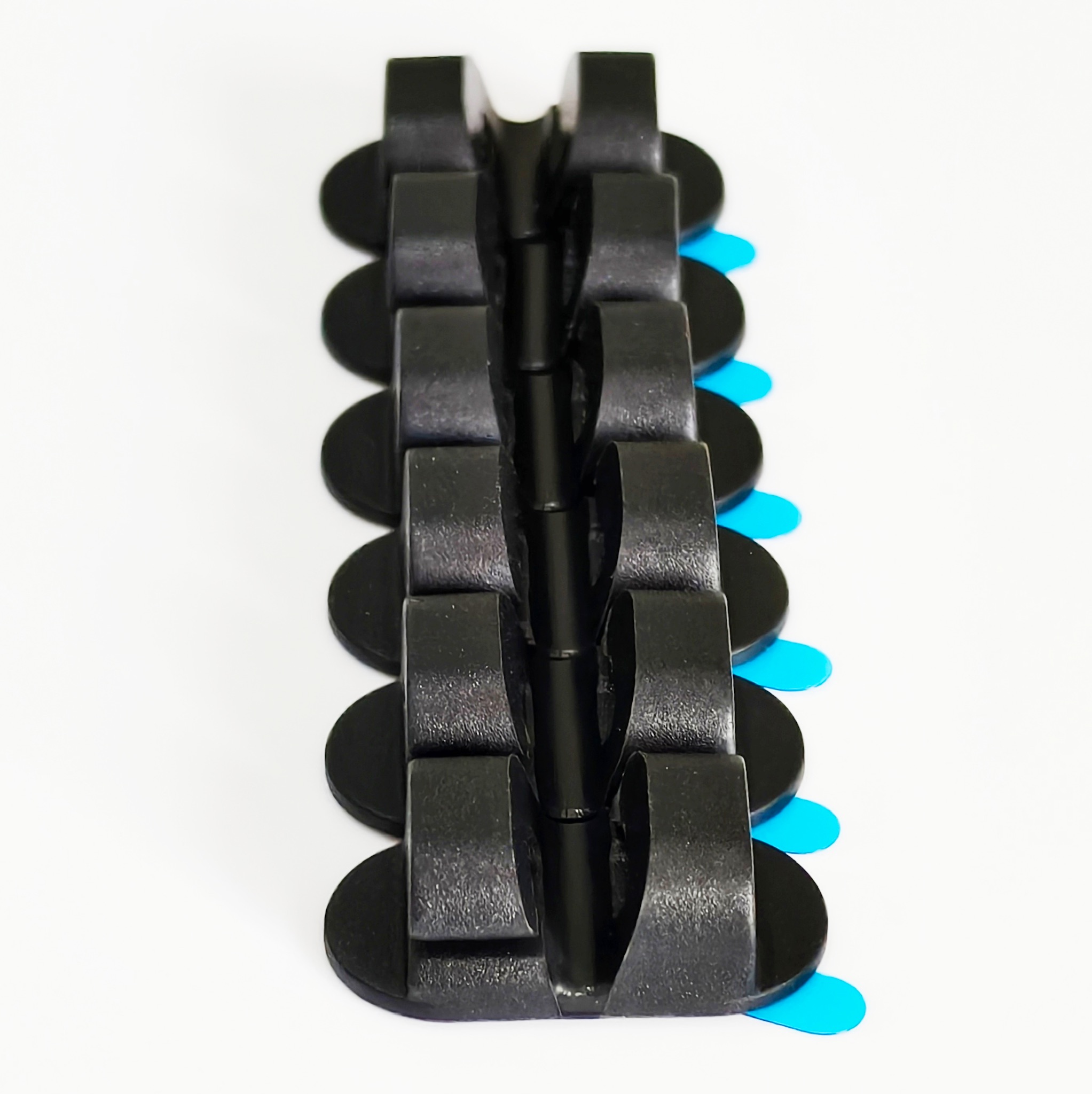 Dual-Slot Oval Silicone Cord Organizer with Adhesive Backing