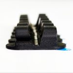 Dual-Slot Oval Silicone Cord Organizer with Adhesive Backing