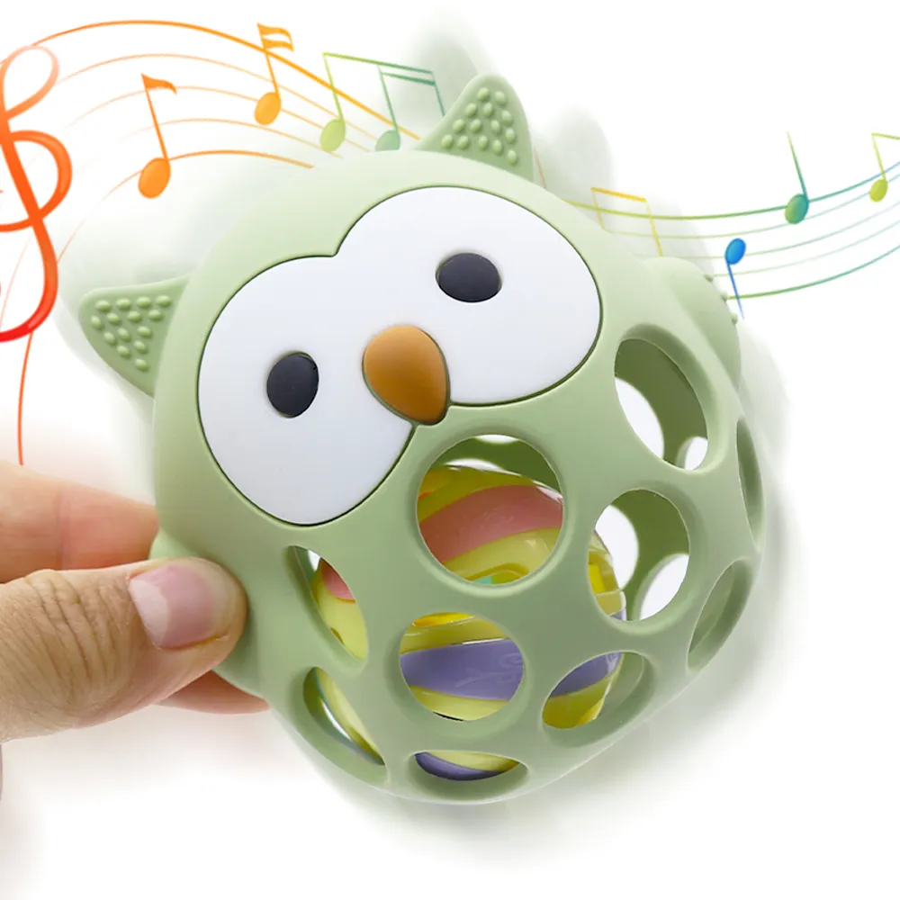 Green hollow owl silicone teether ball with built-in rattle, open-hole design for easy grip, food-grade BPA-free